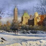 Snowy landscape with small trees. Large buildings and skyscrapers in the background.