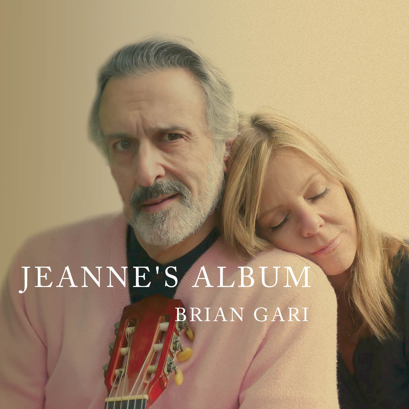 Album cover, "Jeanne's Album, Brian Gari". Garihods the head of the guitar against his chest, and a woman rests her head on his shoulder, her eyes closed.