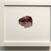 "Eye" in a white frame.