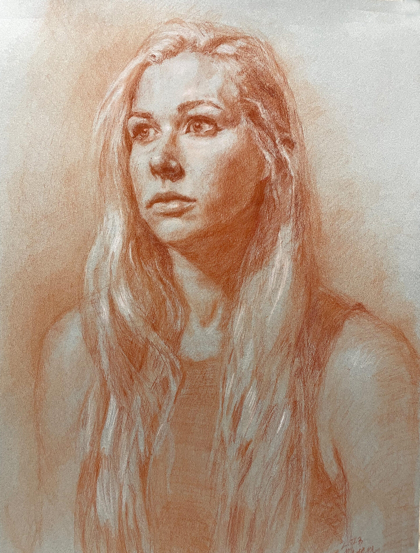 In shades of orange, a woman with long, light hair.
