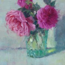 A painting of pink roses in a green vase.