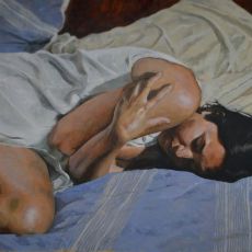 A painting of a woman laying on a bed.
