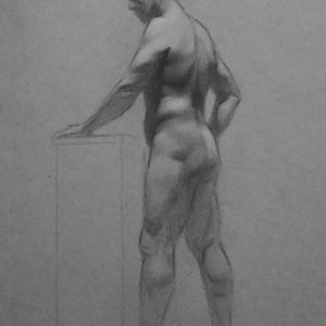 A drawing of a nude man standing in front of a box.
