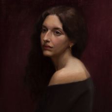 A painting of a woman with long hair.