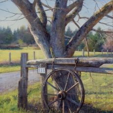 A painting of an old wagon next to a tree.